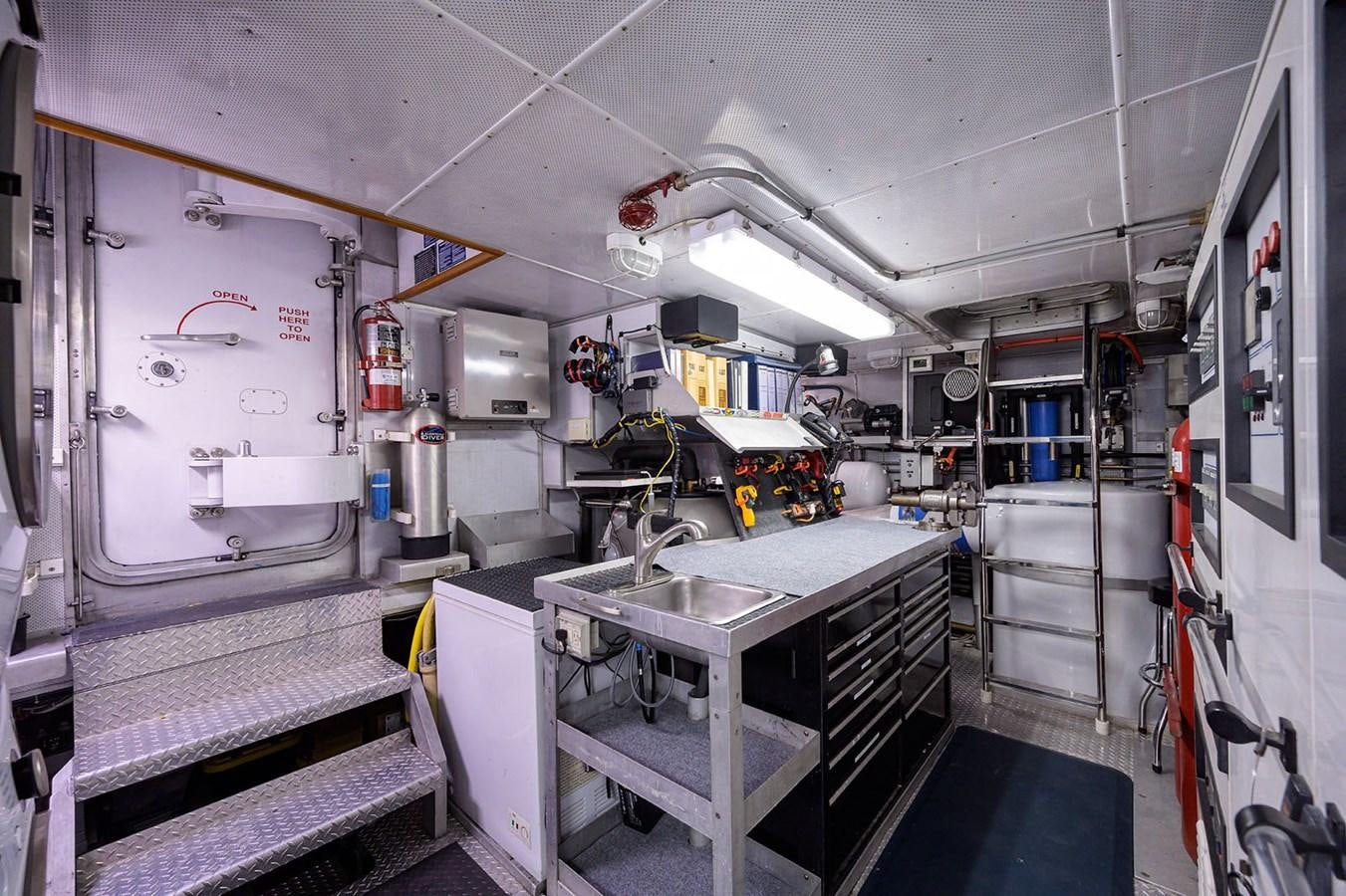 a room with a sink and a large machine aboard IMPETUOUS Yacht for Sale