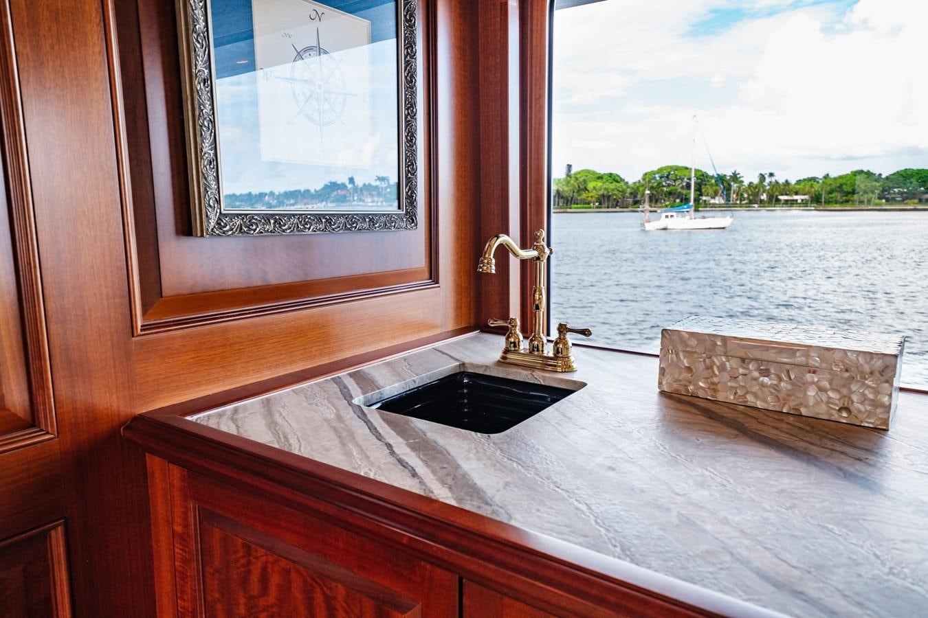 a mirror on a window aboard IMPETUOUS Yacht for Sale