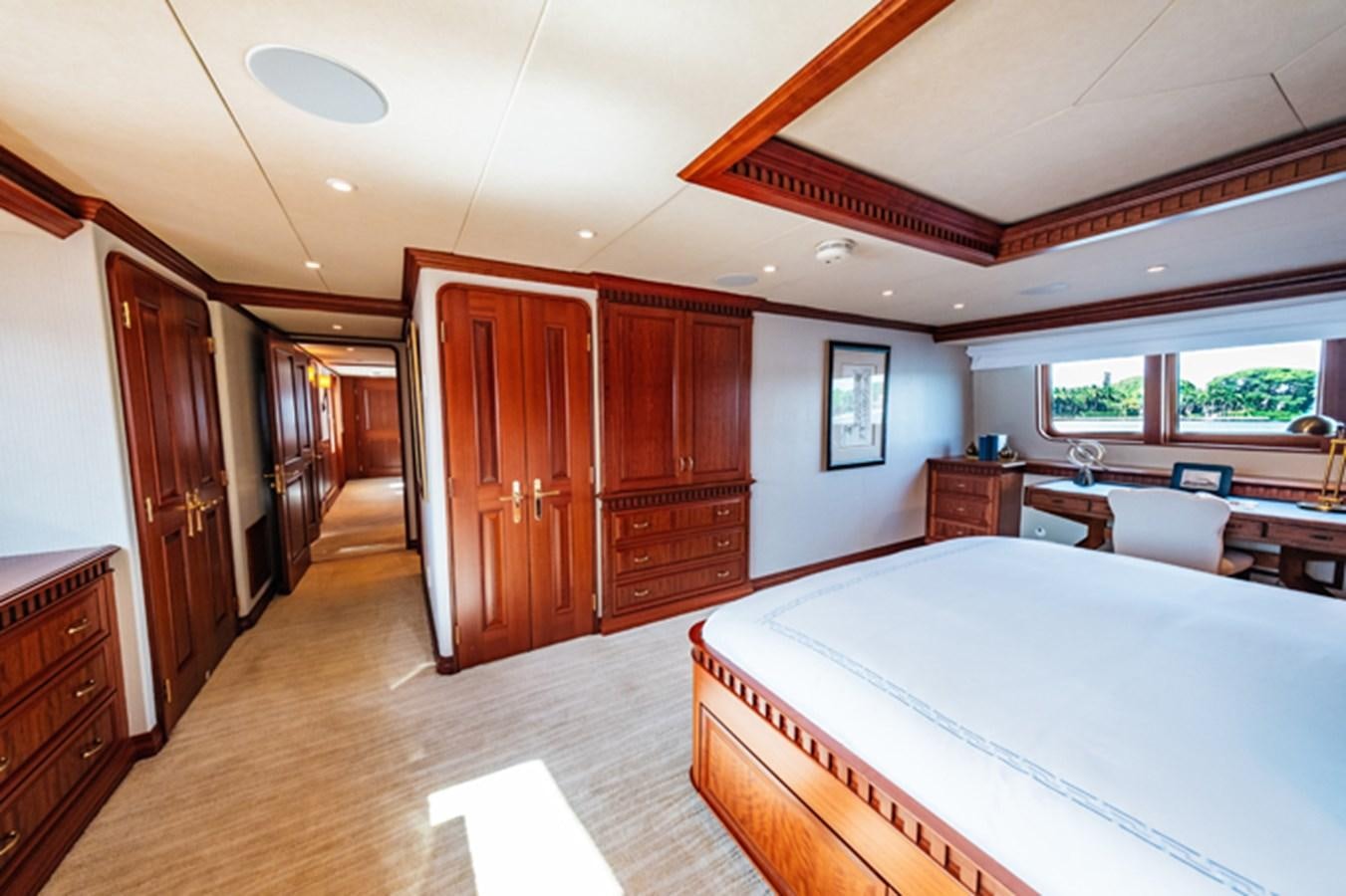 a large bedroom with a large bed aboard IMPETUOUS Yacht for Sale