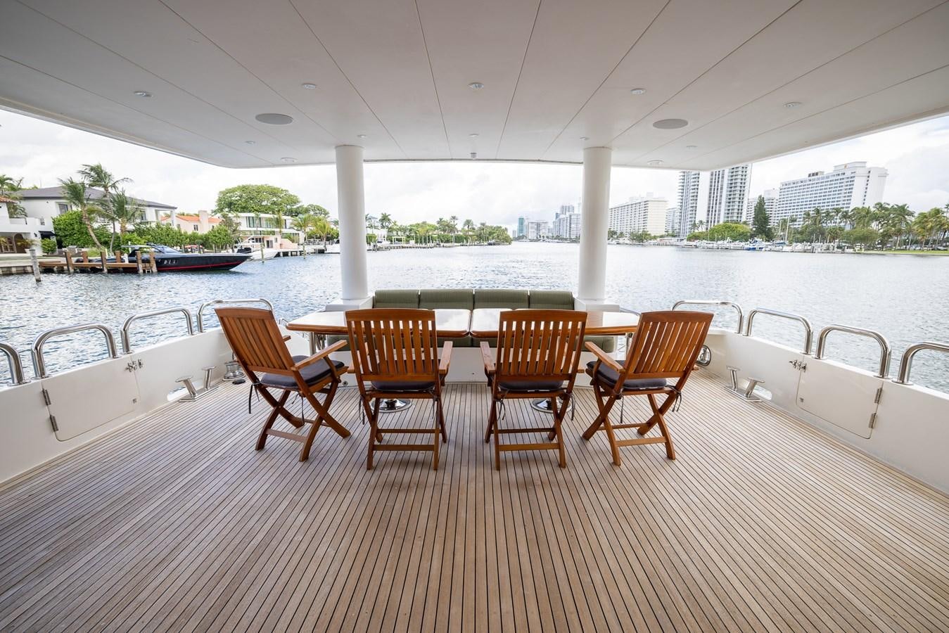 a group of chairs on a deck aboard OCEAN 1 Yacht for Sale