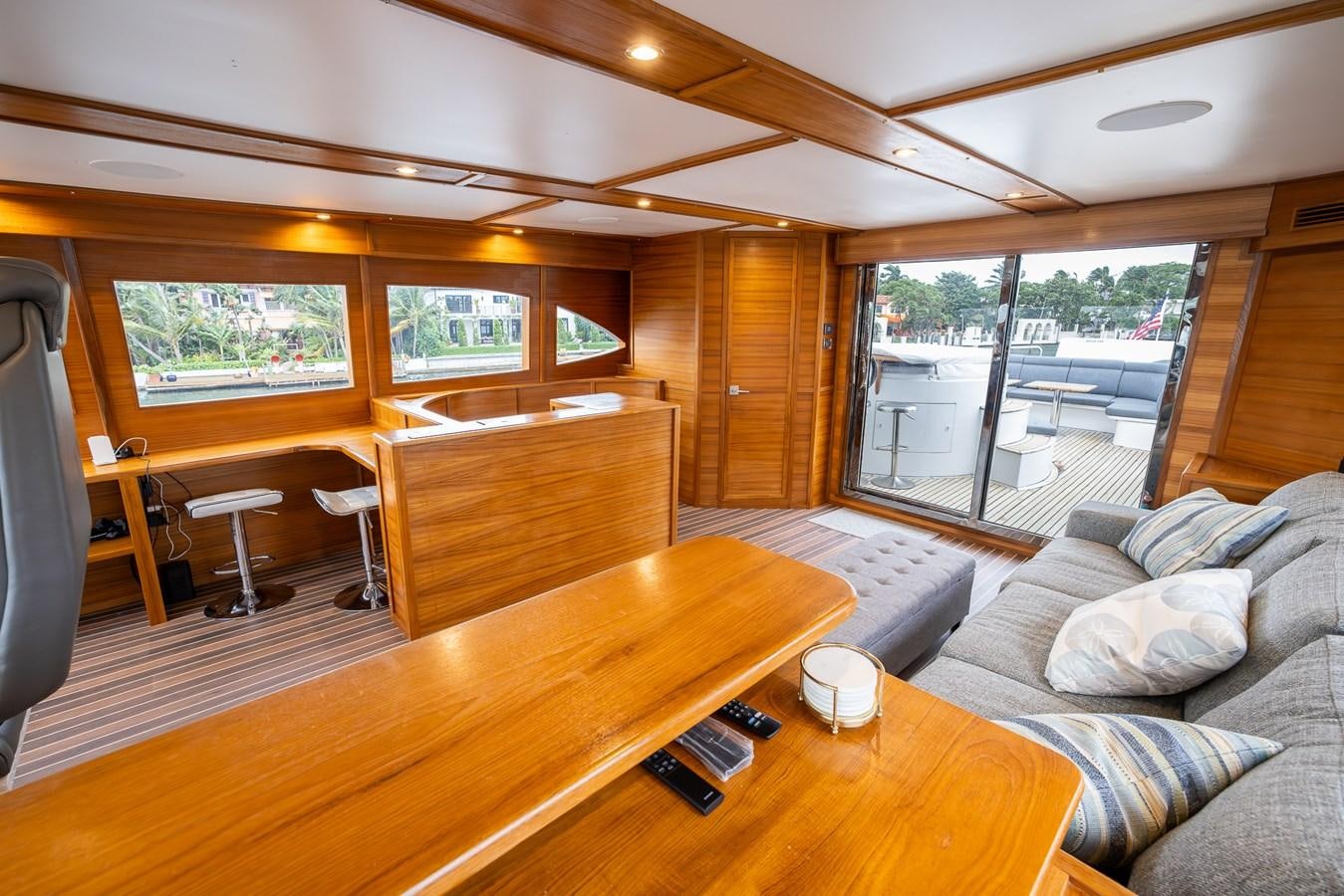 a living room with a couch and a table aboard OCEAN 1 Yacht for Sale