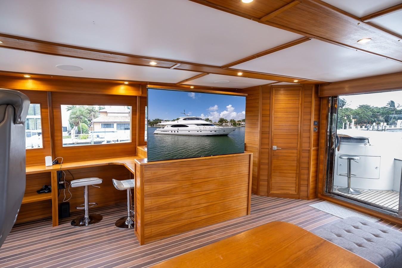 a room with a large screen aboard OCEAN 1 Yacht for Sale