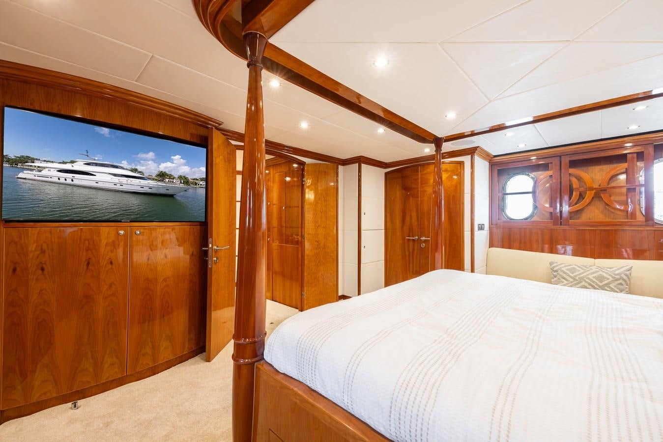 a room with a bed and a wood frame aboard OCEAN 1 Yacht for Sale