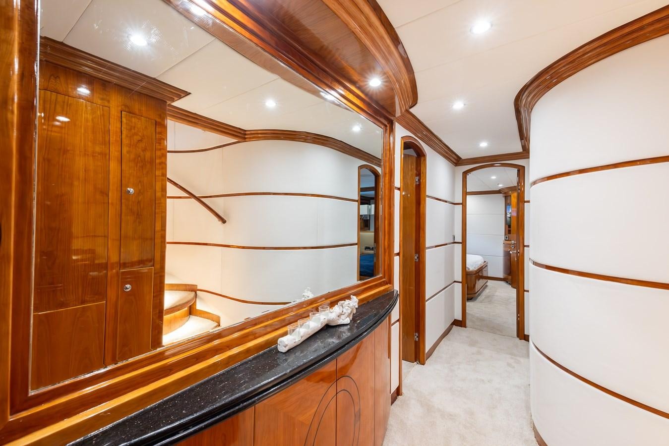 a bathroom with a large mirror aboard OCEAN 1 Yacht for Sale