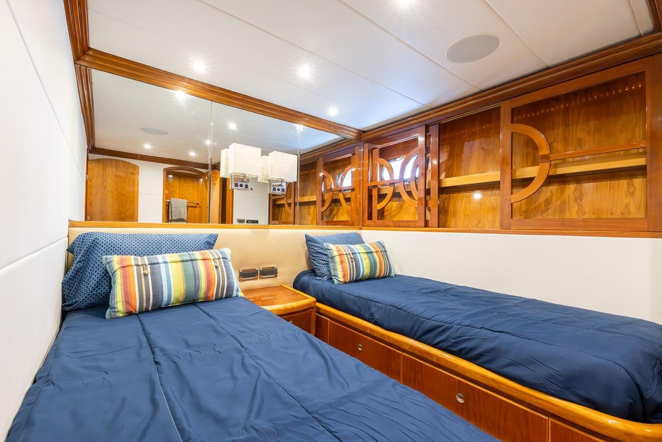a room with two beds aboard OCEAN 1 Yacht for Sale