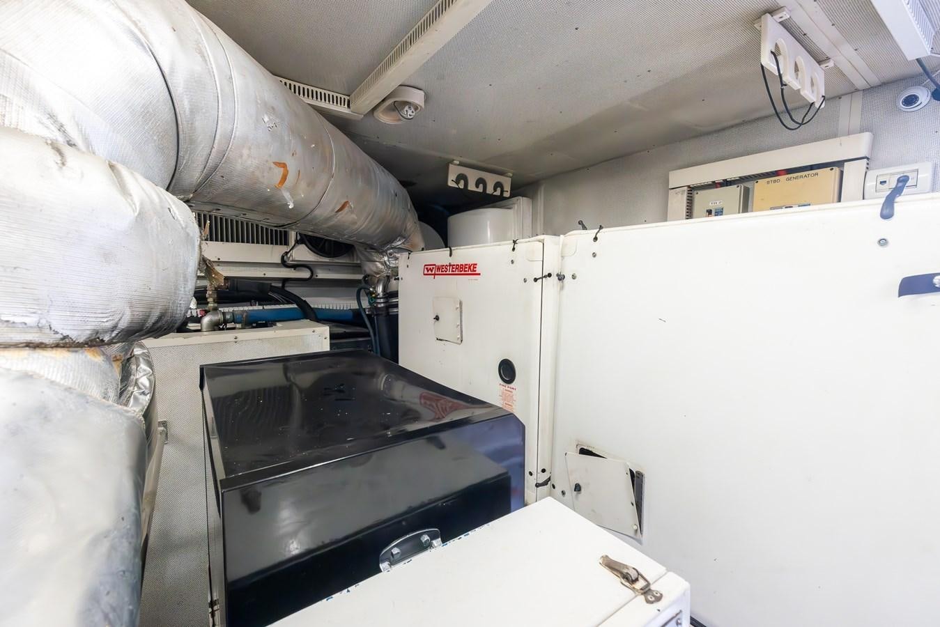 a large white machine aboard OCEAN 1 Yacht for Sale