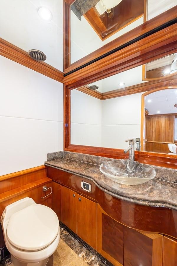 a bathroom with a sink and a toilet aboard OCEAN 1 Yacht for Sale