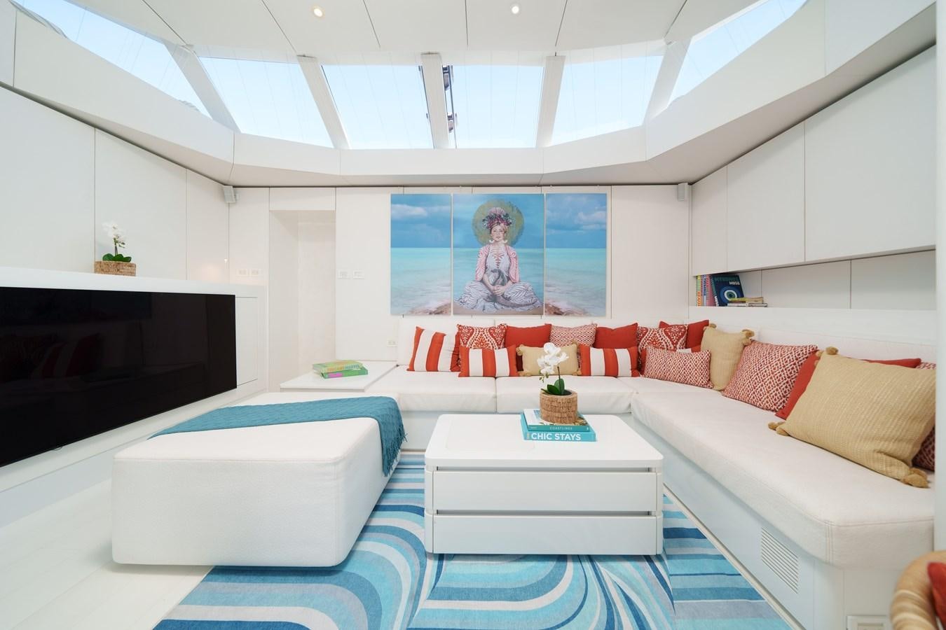 a room with a couch and a table aboard ROYAL RITA Yacht for Sale