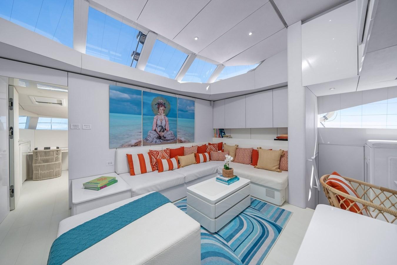 a room with a couch and a table aboard ROYAL RITA Yacht for Sale