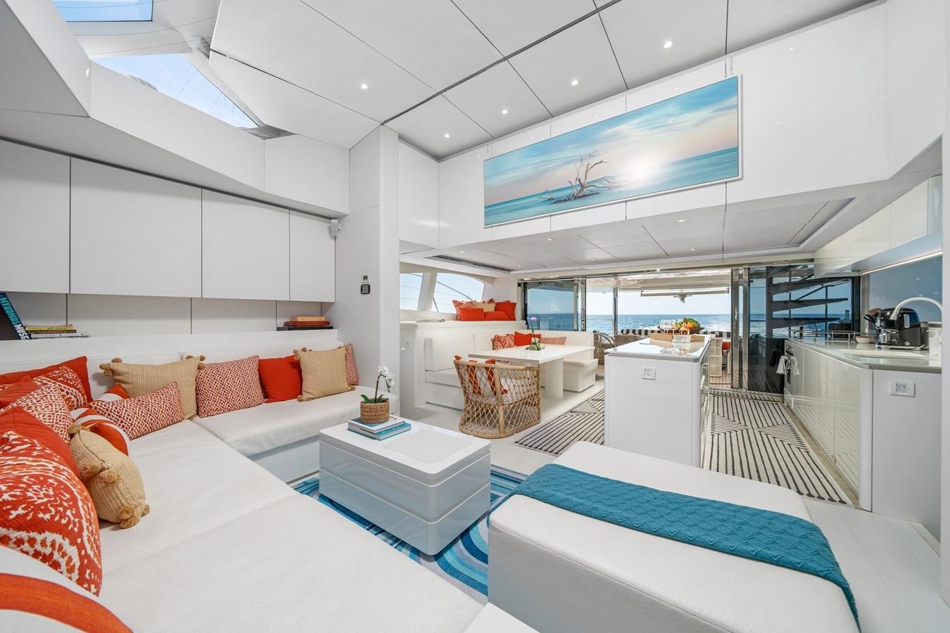 a room with a bed and a table aboard ROYAL RITA Yacht for Sale