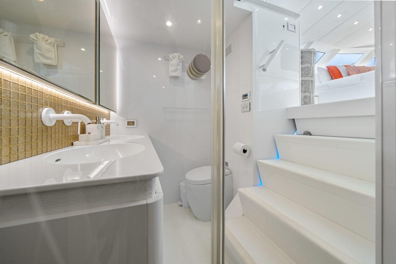 a bathroom with a sink and a toilet aboard ROYAL RITA Yacht for Sale