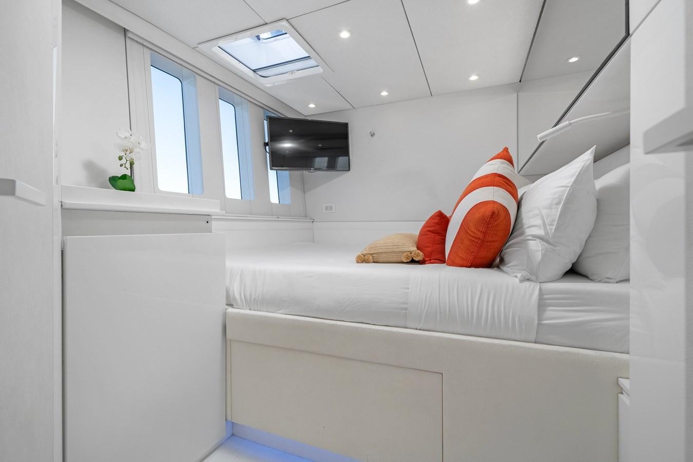 a white couch with pillows aboard ROYAL RITA Yacht for Sale