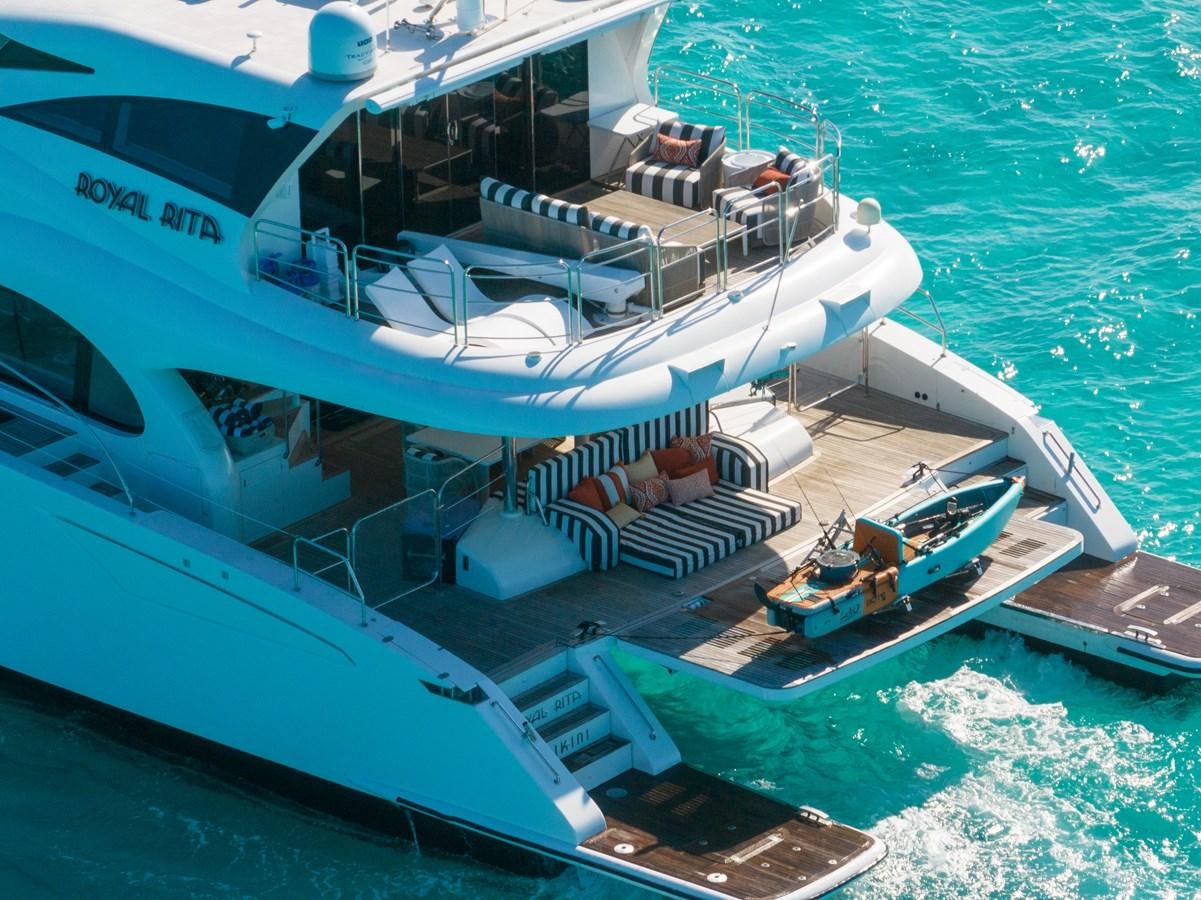 a large white boat on the water aboard ROYAL RITA Yacht for Sale