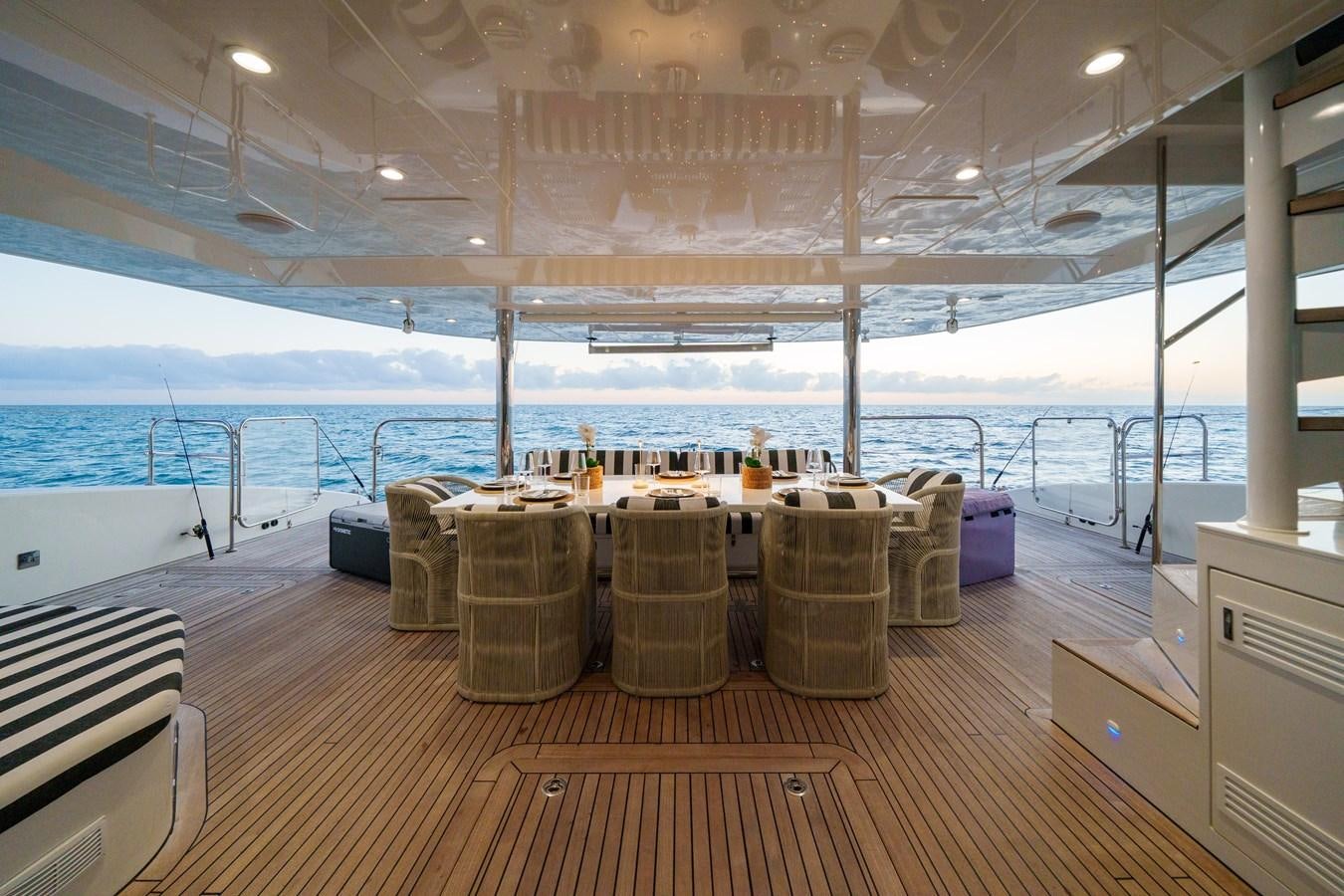 a table with bottles on it aboard ROYAL RITA Yacht for Sale