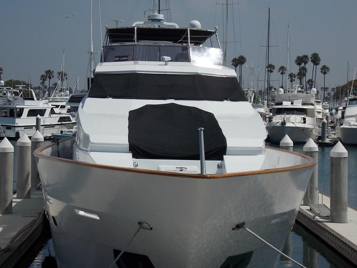 a boat in a harbor aboard PACIFIC PEARL Yacht for Sale