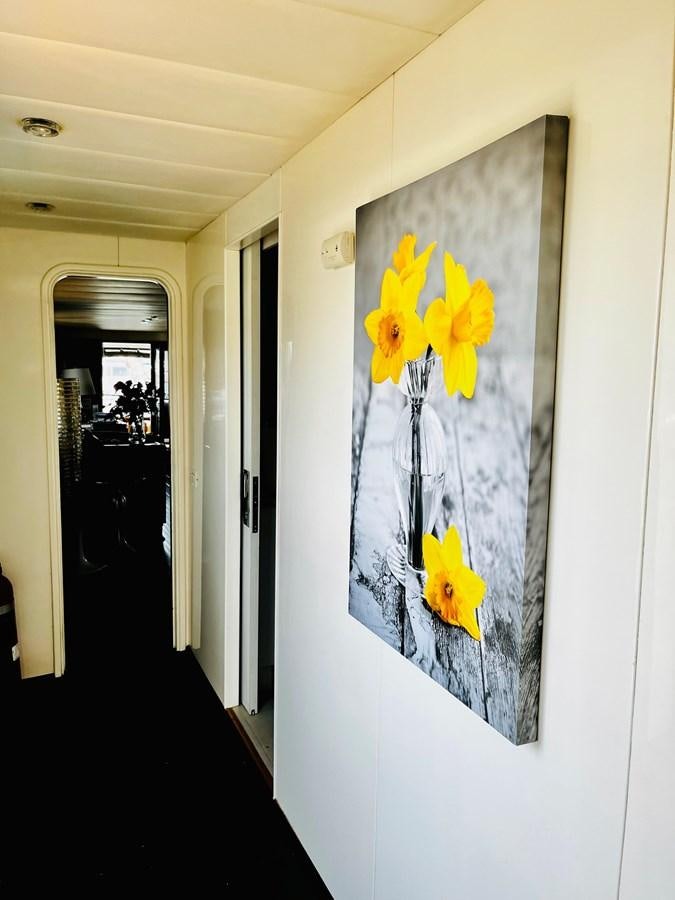 a wall with a painting on it aboard PACIFIC PEARL Yacht for Sale
