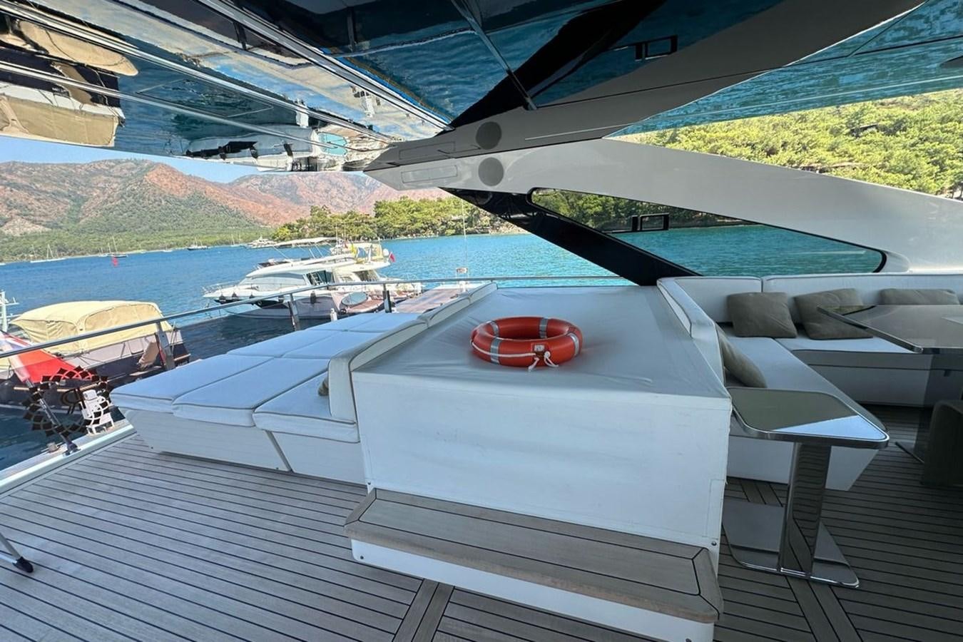 a car parked on a deck aboard REKOMA Yacht for Sale