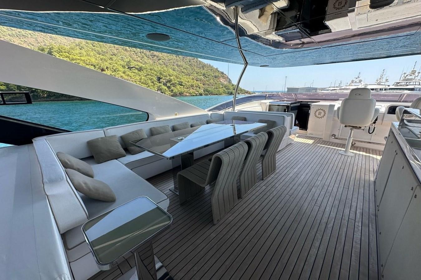 a deck with a pool and a deck aboard REKOMA Yacht for Sale