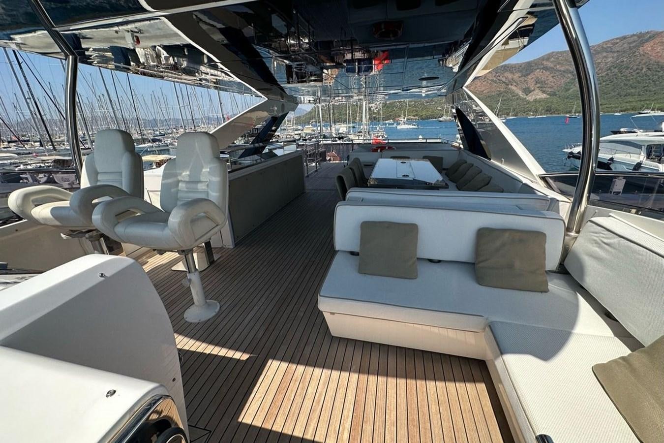 a boat with a couch aboard REKOMA Yacht for Sale