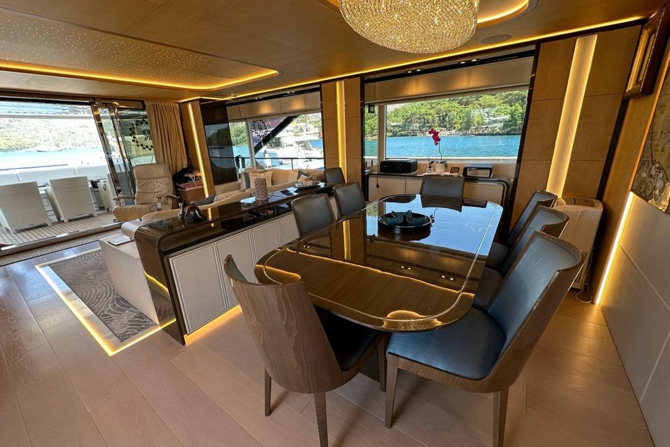 a kitchen and dining area aboard REKOMA Yacht for Sale