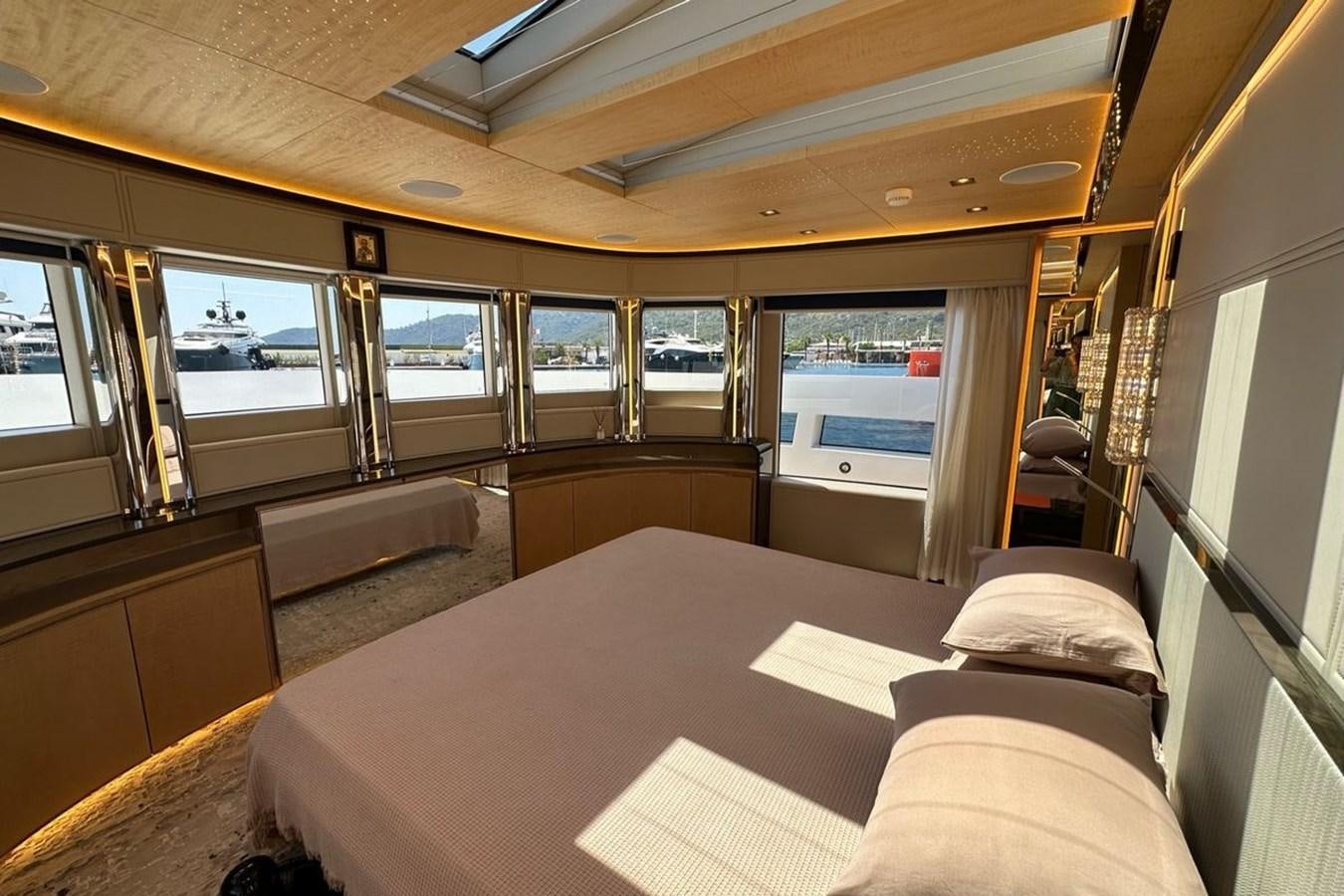 a bus with a table and chairs aboard REKOMA Yacht for Sale