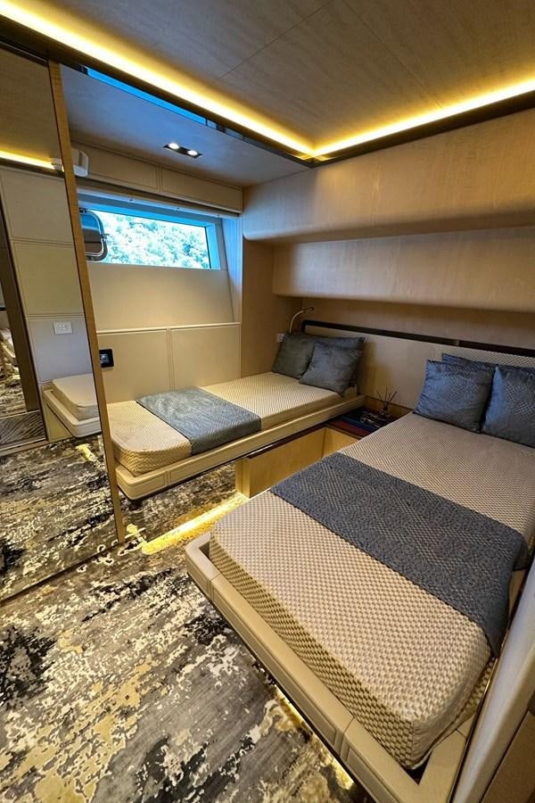 a bed in a room aboard REKOMA Yacht for Sale