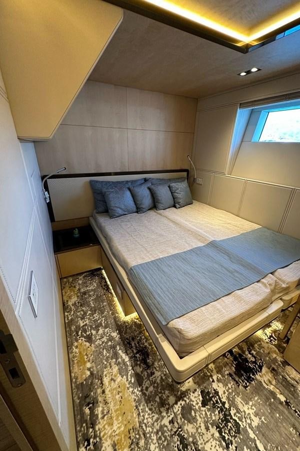 a bed in a room aboard REKOMA Yacht for Sale