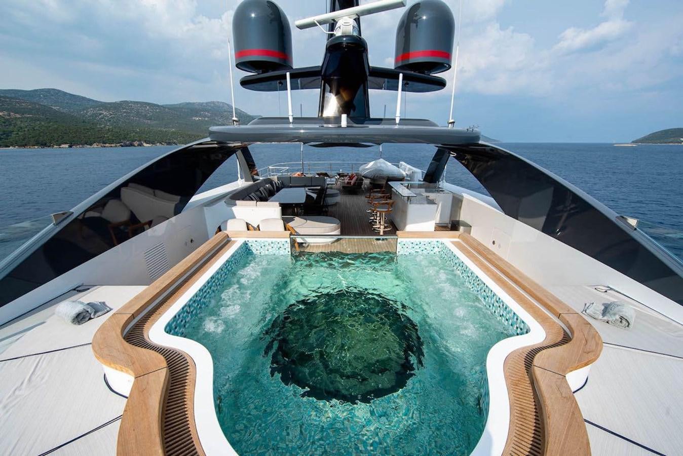 a boat with a green plant in it aboard STARBURST III Yacht for Sale