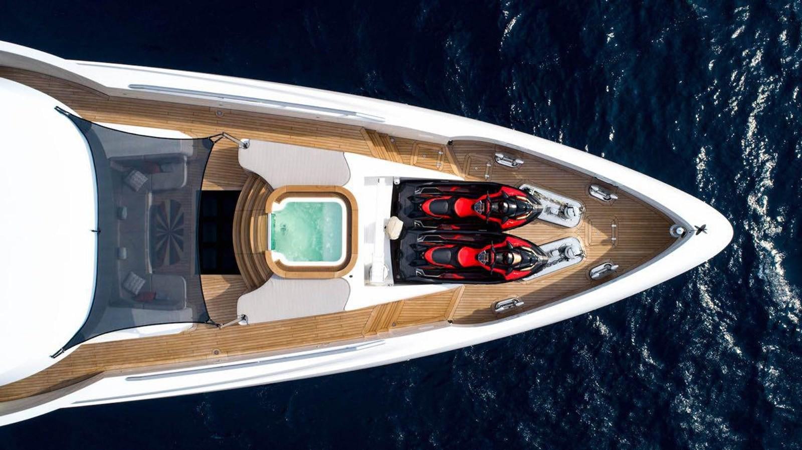 a car with a screen aboard STARBURST III Yacht for Sale