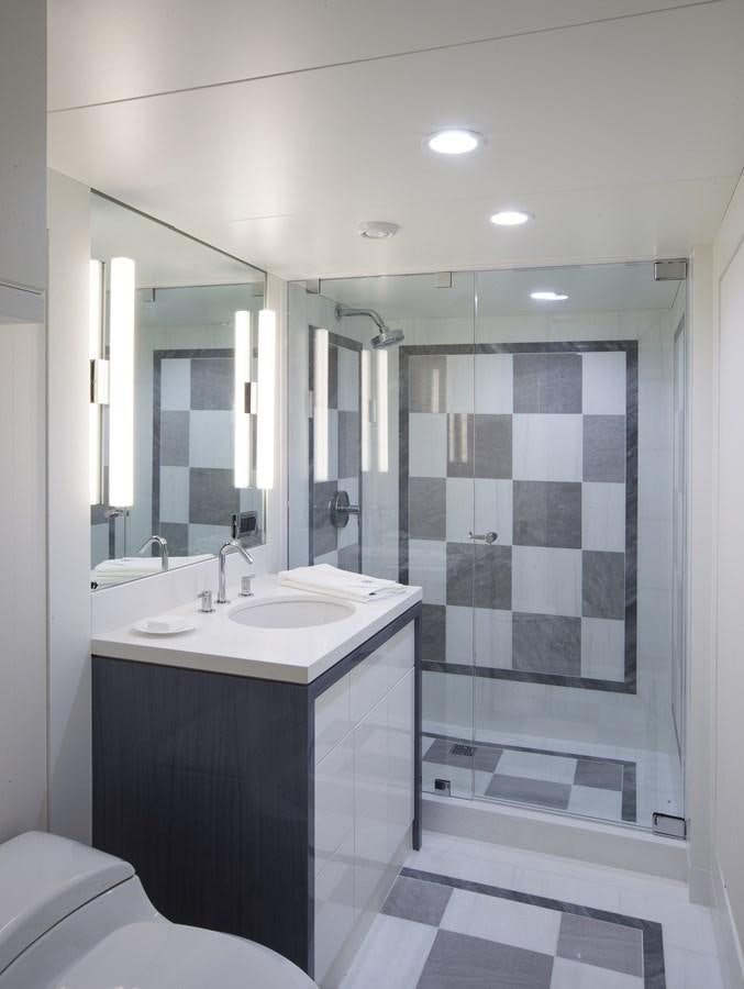 a bathroom with a standup shower aboard BG Yacht for Sale