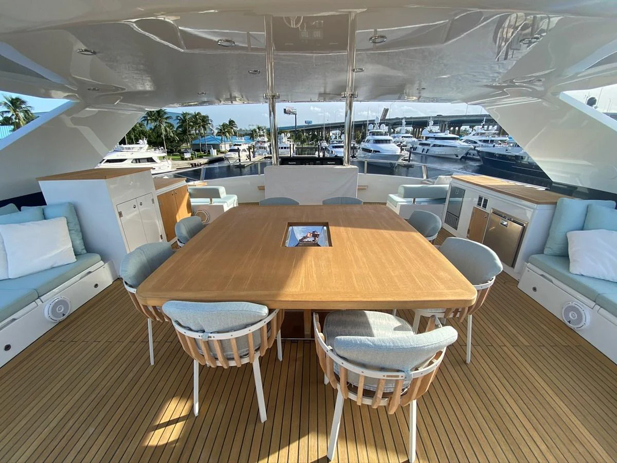 a room with a table and chairs aboard PERSISTENCE Yacht for Sale