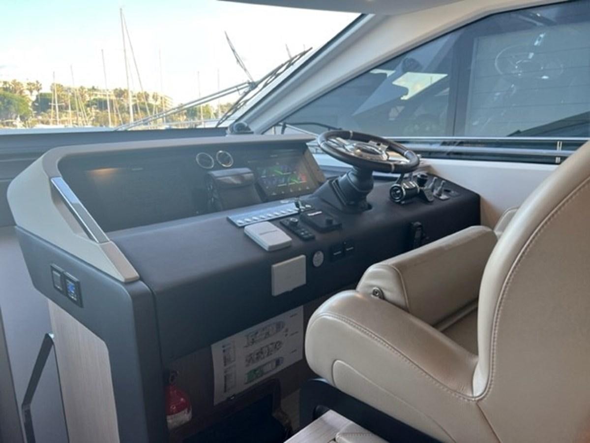 the inside of a car aboard SOLSTICE Yacht for Sale
