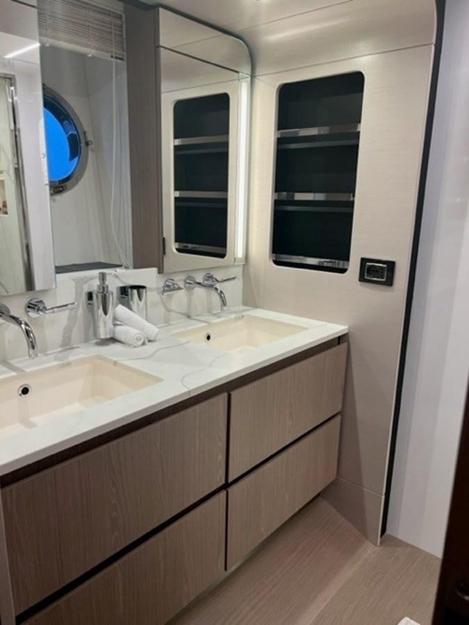 a bathroom with two sinks aboard SOLSTICE Yacht for Sale