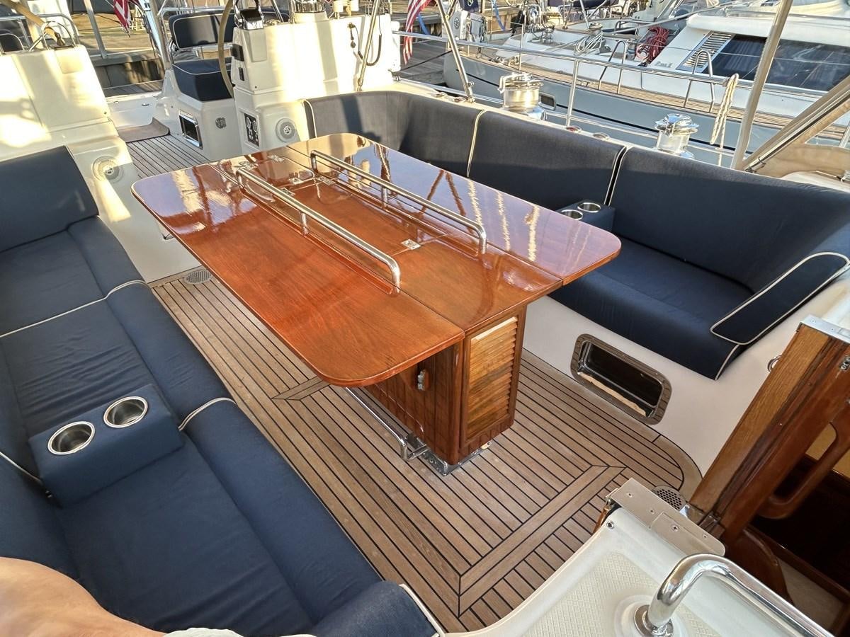 a table on a boat aboard TRIUMPH Yacht for Sale