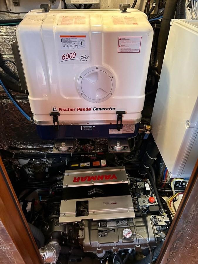 a machine with a large piece of machinery in the back aboard TRIUMPH Yacht for Sale