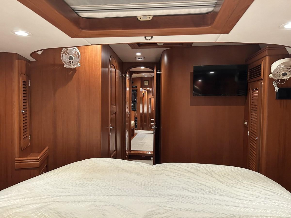 a bed in a room aboard TRIUMPH Yacht for Sale