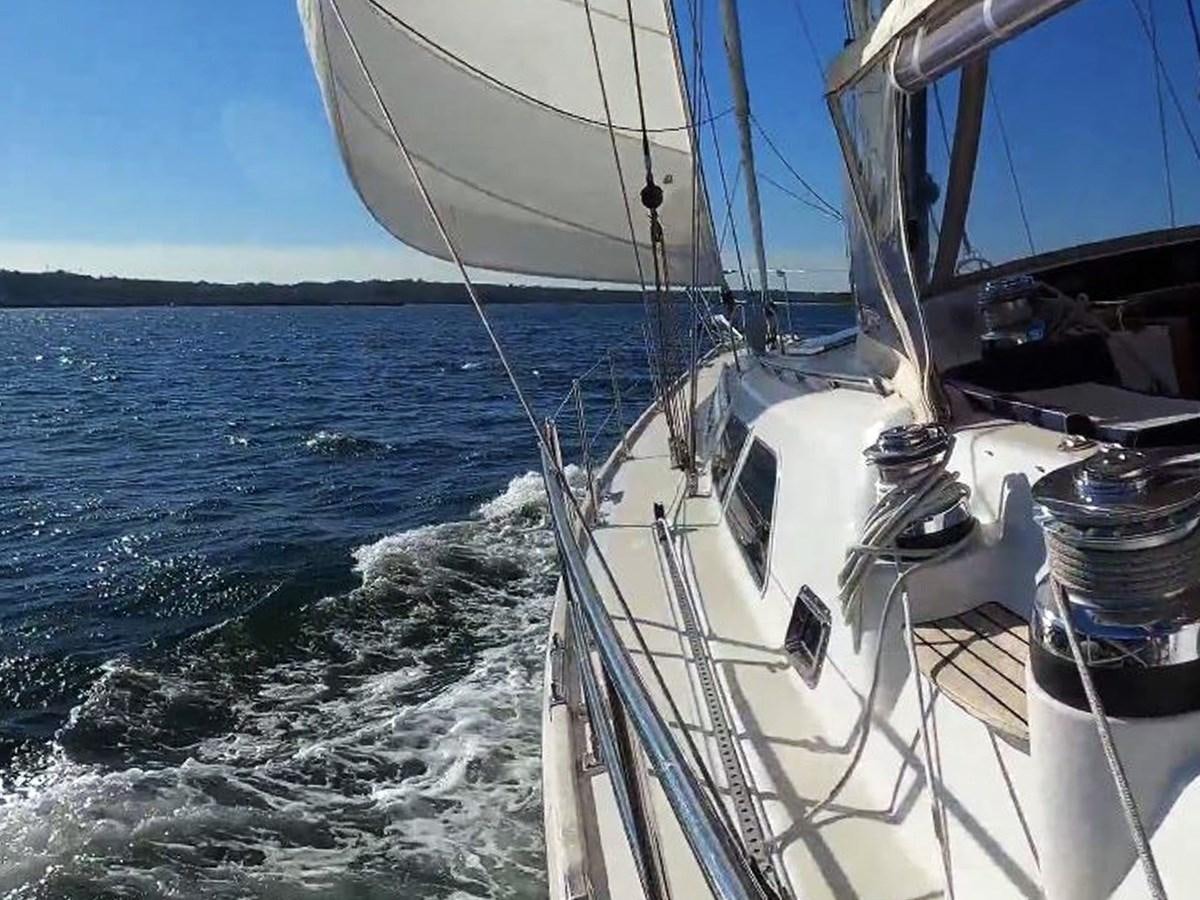 a boat on the water aboard TRIUMPH Yacht for Sale