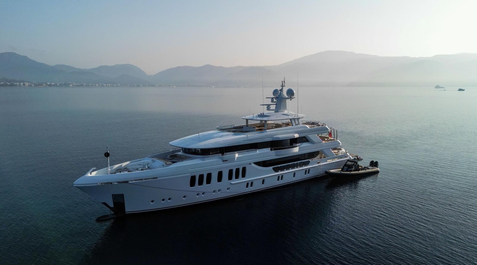 a large white boat in the water aboard M 47 Yacht for Sale