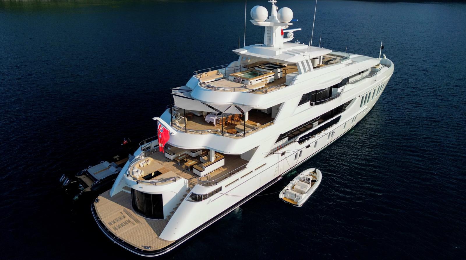 a large white boat on the water aboard M 47 Yacht for Sale