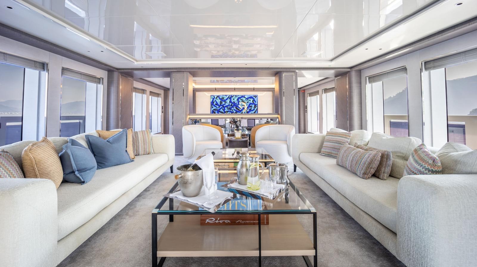 a living room with a couch and a coffee table aboard M 47 Yacht for Sale