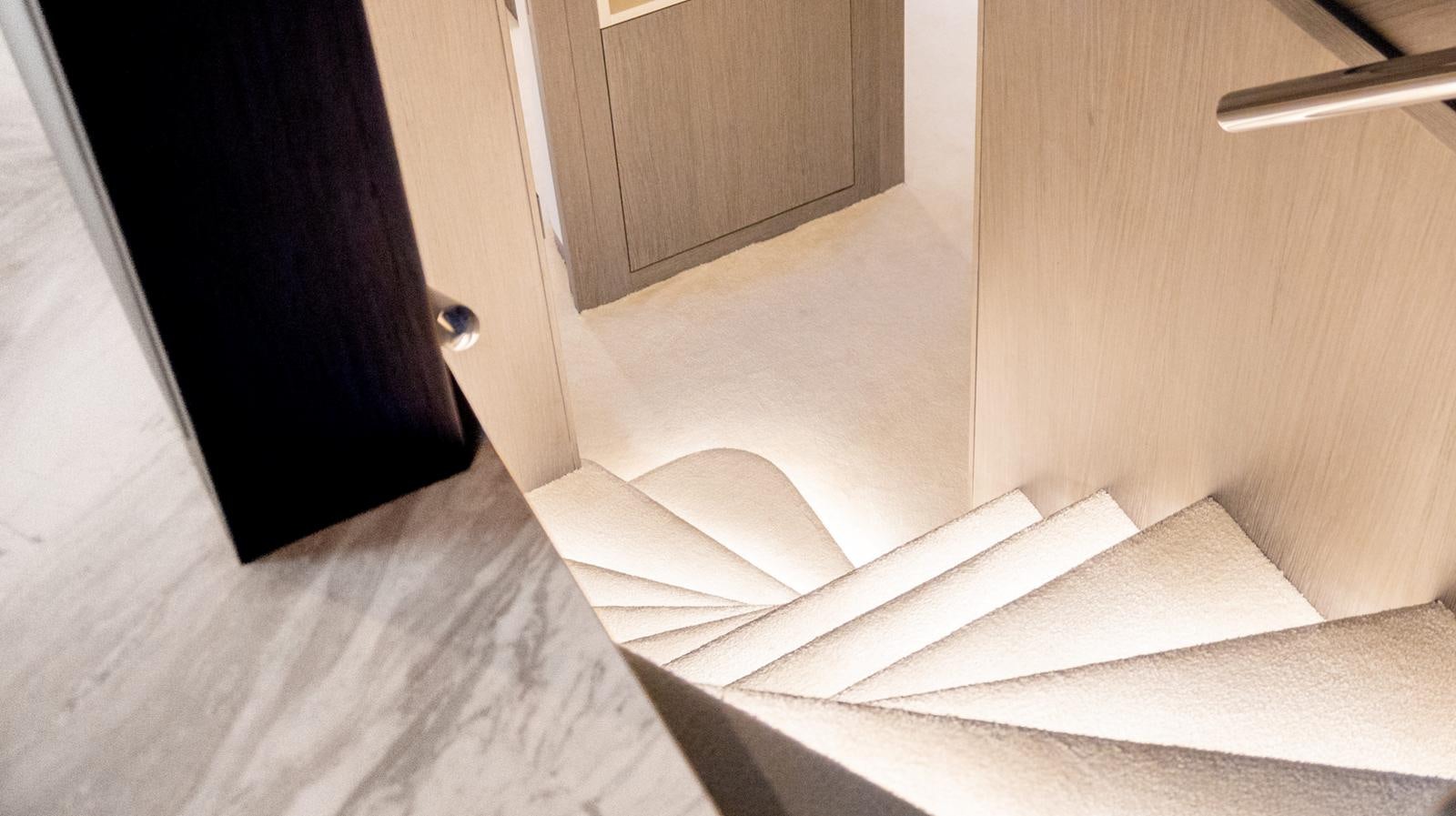 a white door with a handle aboard M 47 Yacht for Sale