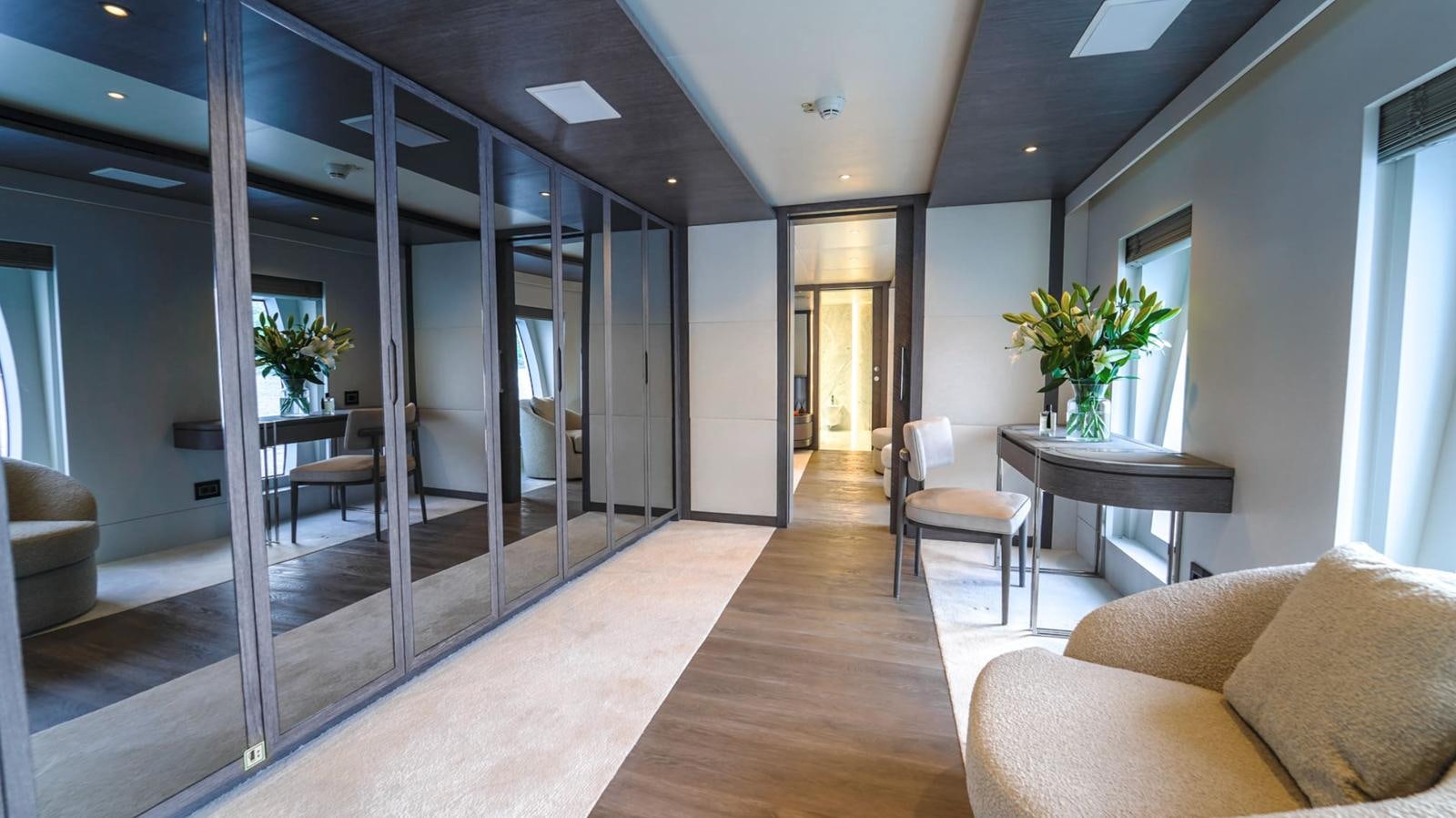 a room with a table chairs and a couch aboard M 47 Yacht for Sale