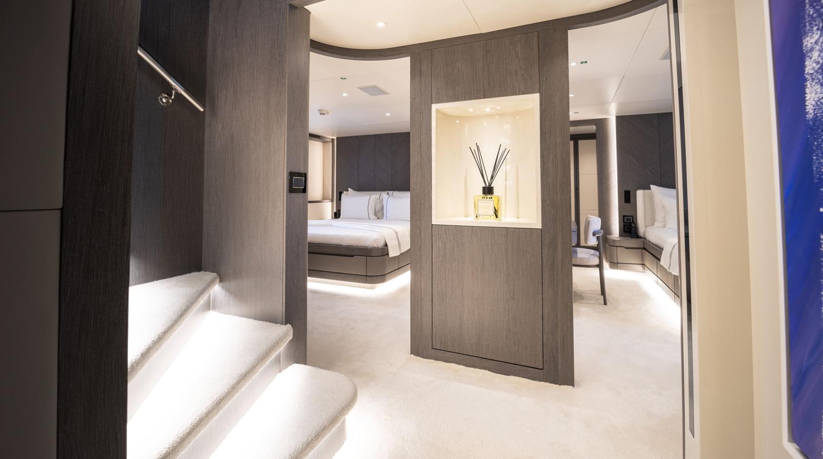 a room with a bed and a mirror aboard M 47 Yacht for Sale