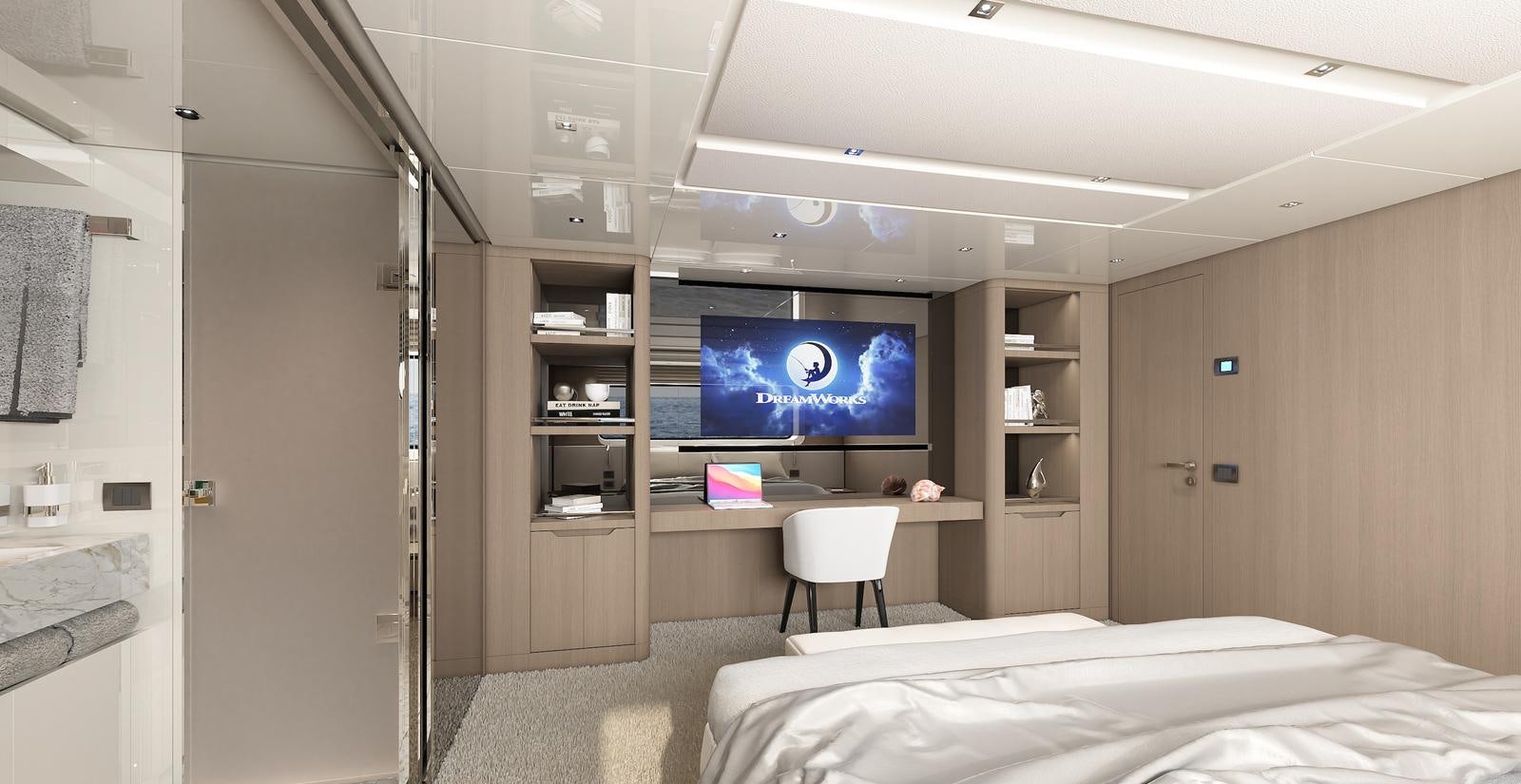 a room with a bed and a tv on the wall aboard X370 Yacht for Sale
