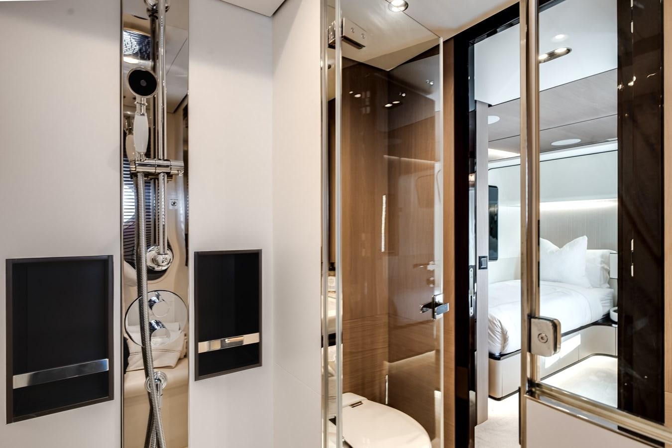 a bathroom with a glass shower aboard DAYBREAK Yacht for Sale