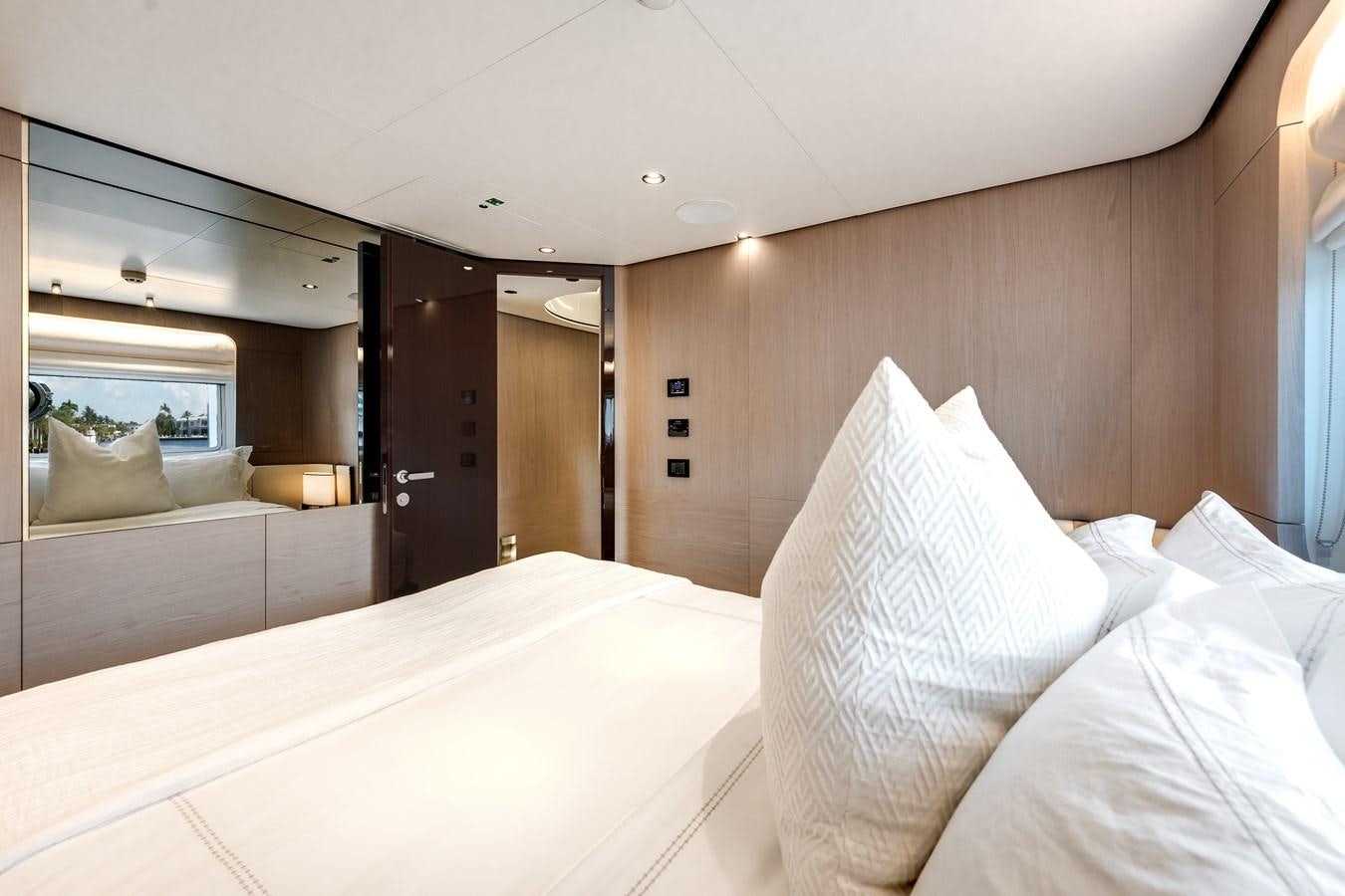 a hotel room with a bed aboard DAYBREAK Yacht for Sale