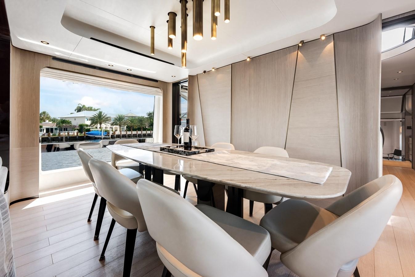a large table with chairs around it aboard DAYBREAK Yacht for Sale