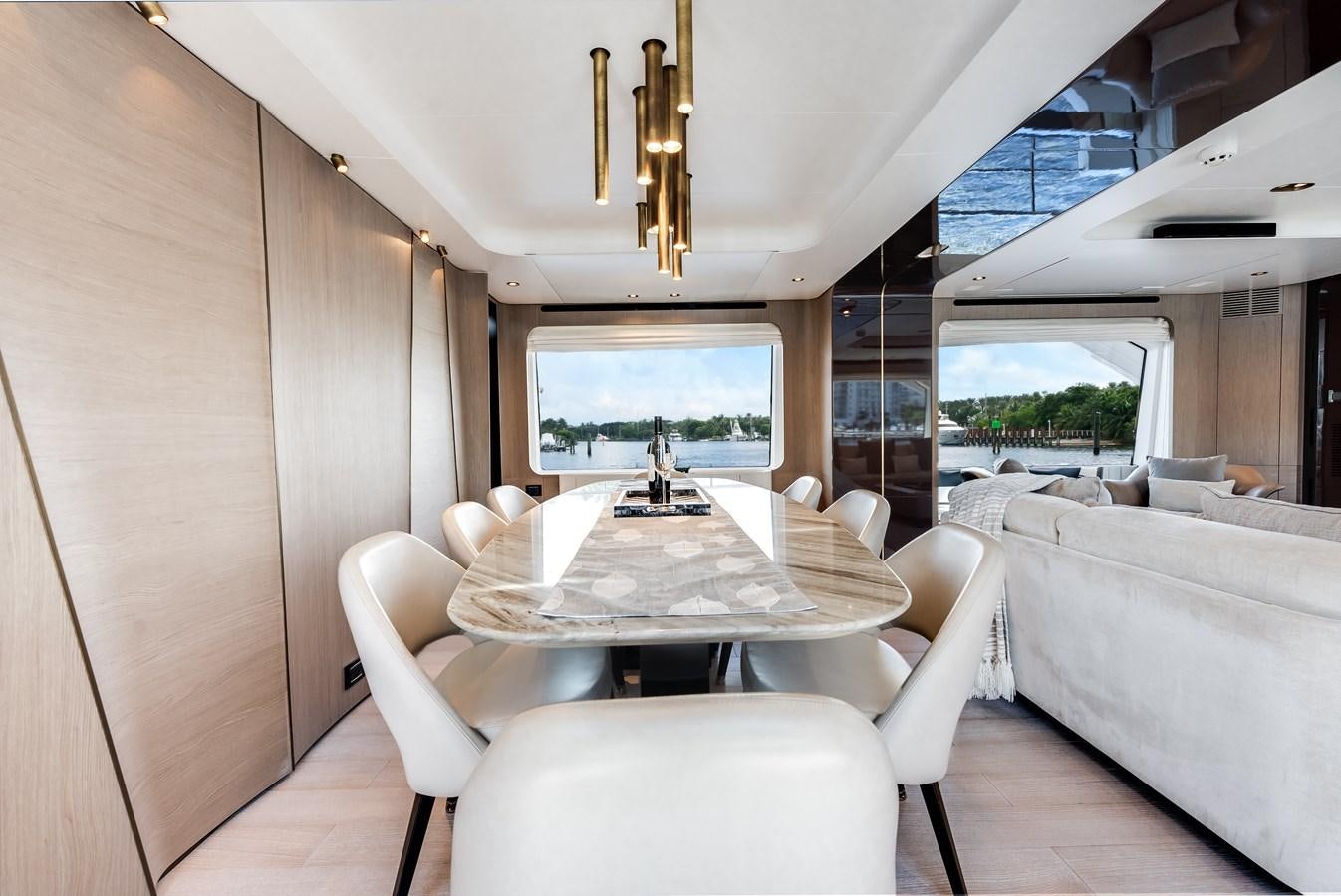 a dining table in a room aboard DAYBREAK Yacht for Sale