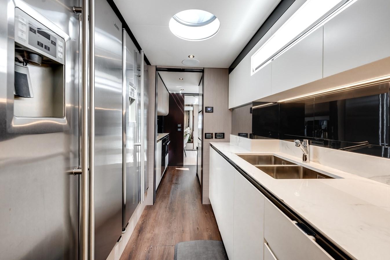 a long hallway with a countertop aboard DAYBREAK Yacht for Sale