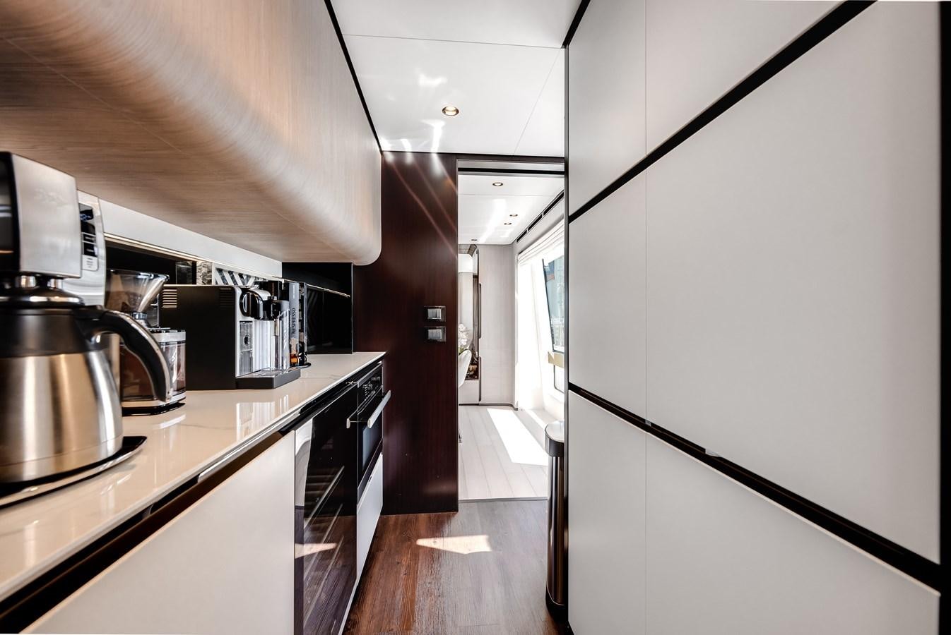 a kitchen with a stainless steel pot aboard DAYBREAK Yacht for Sale